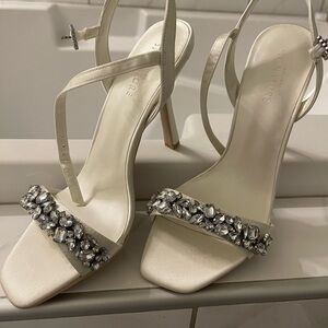 Elegant Signature White Heels with Gem Embellishments